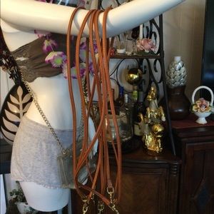 Genuine leather bag strap in brown color.